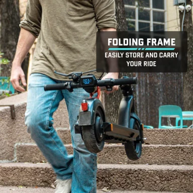 Rider transporting an Gotrax G4 electric scooter along a smooth city walking downstairs