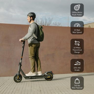 Teenage boy driving a Segway Ninebot MAX G2
